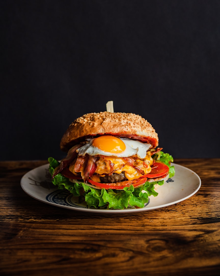 selective focus photography of burger and fries